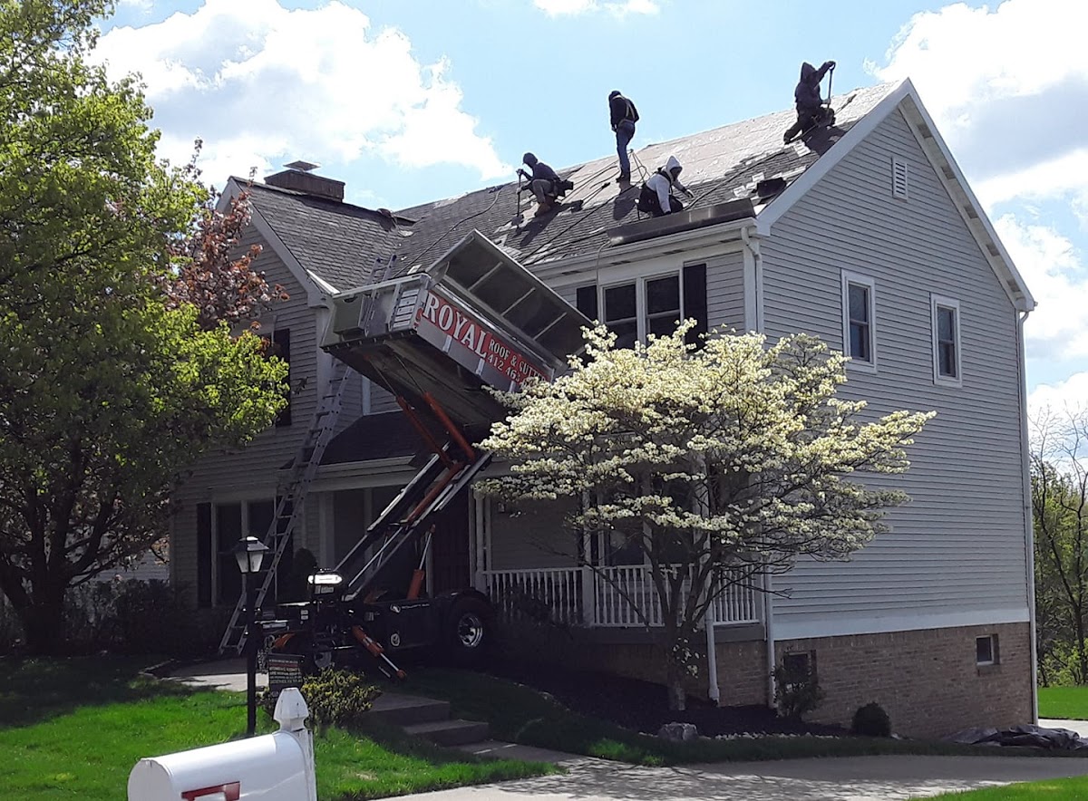 Roof and gutter work completed on a residential home